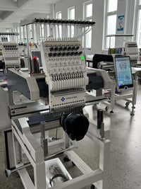 Kreatek III BL-1501 high-speed industrial embroidery machine with touchscreen, 12/15 needles, and multi-language support for caps and textiles.