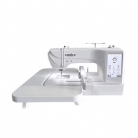 Kreatek ES6 Sy & Broderimaskin high-speed computerized sewing and embroidery machine in white with touchscreen display and extended work table.