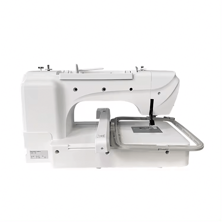 White Kreatek ES6 Sy & Broderimaskin computer-controlled sewing and embroidery machine with compact design for high-speed stitching and industrial use