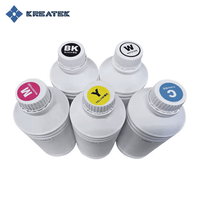 Kreatek DTF-blekk bottles in cyan, magenta, yellow, black, and white for high-quality digital textile printing