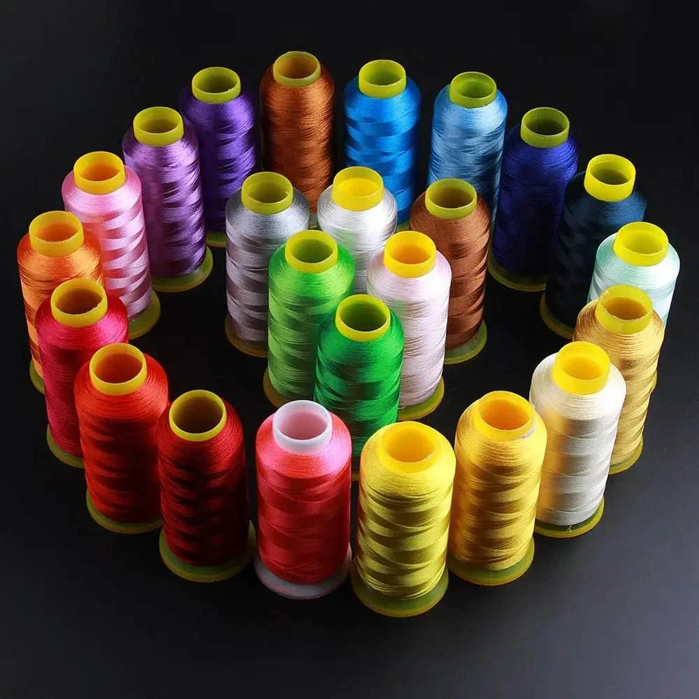 Colorful polyester embroidery thread spools arranged in a circle, showcasing a vibrant selection from a 100-color thread pack.